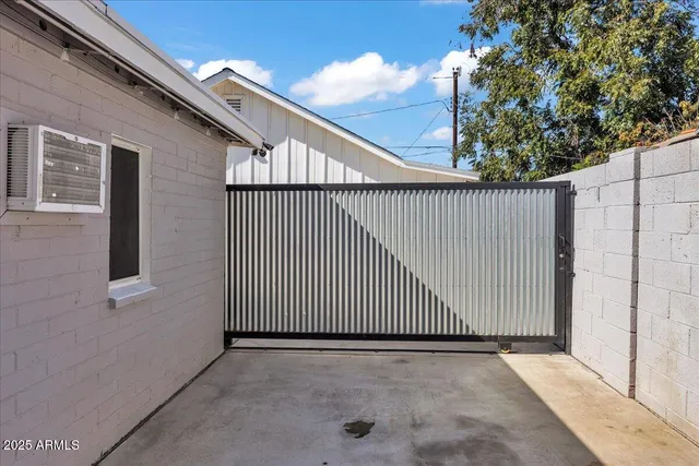 a view of washer and dryer with kitchen countertops