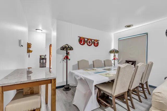 a view of a dining room with furniture