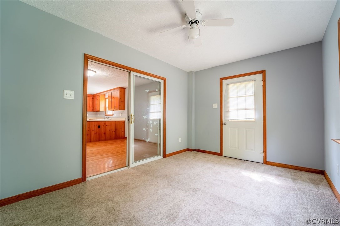2263 Pony Farm Road Maidens, VA 23102 - Photo 16 of 27 an empty room with fan