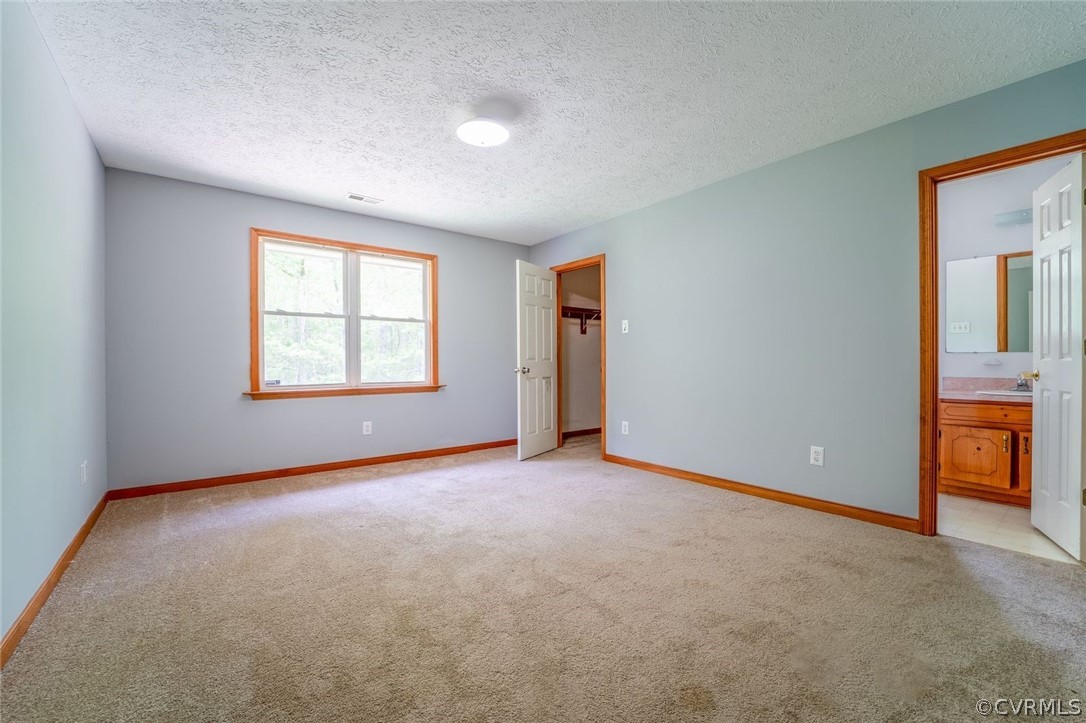 2263 Pony Farm Road Maidens, VA 23102 - Photo 17 of 27 an empty room with windows