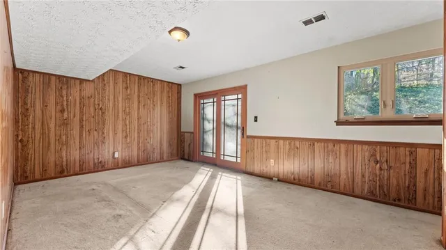 a view of a livingroom with a staircase