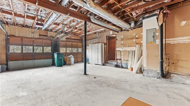 a view of a patio with couches chairs and a fire pit
