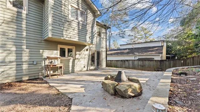 a view of a chairs and tables in the patio