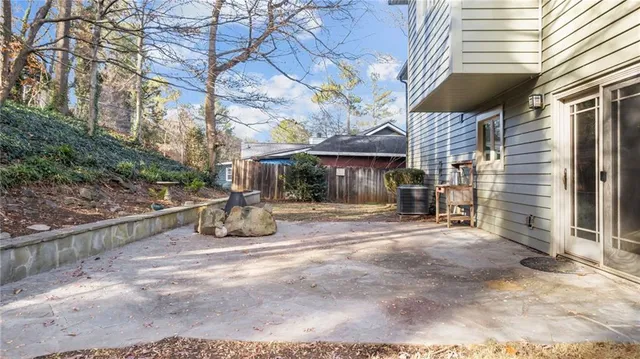 an aerial view of house with yard and mountain view