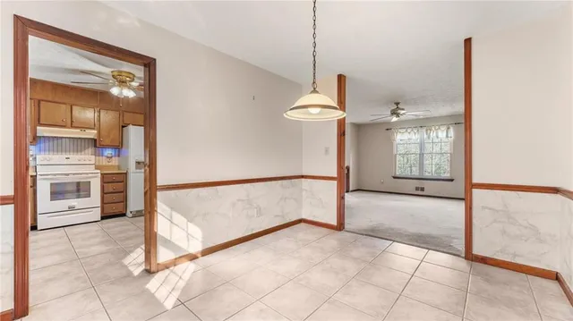 a view of an empty room and window