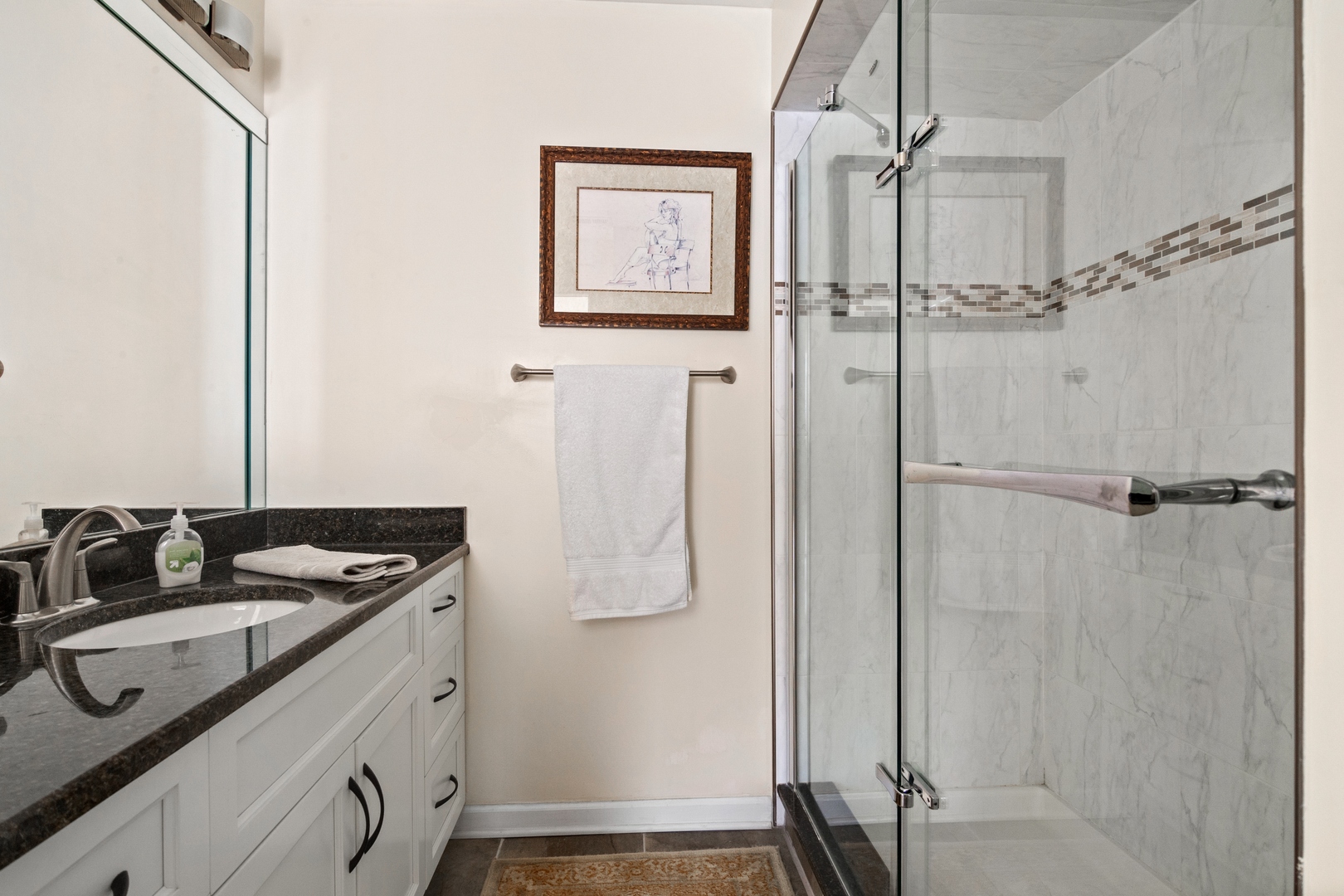 1800 Mission Hills Road, Unit 212 Northbrook, IL 60062 - Photo 16 of 19 a bathroom with a granite countertop sink a shower and a mirror