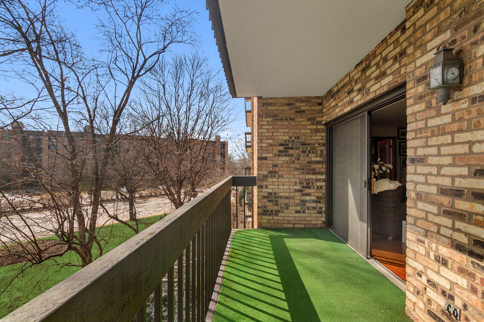 1800 Mission Hills Road, Unit 212 Northbrook, IL 60062 - Photo 17 of 19 a view of a pathway both side of building