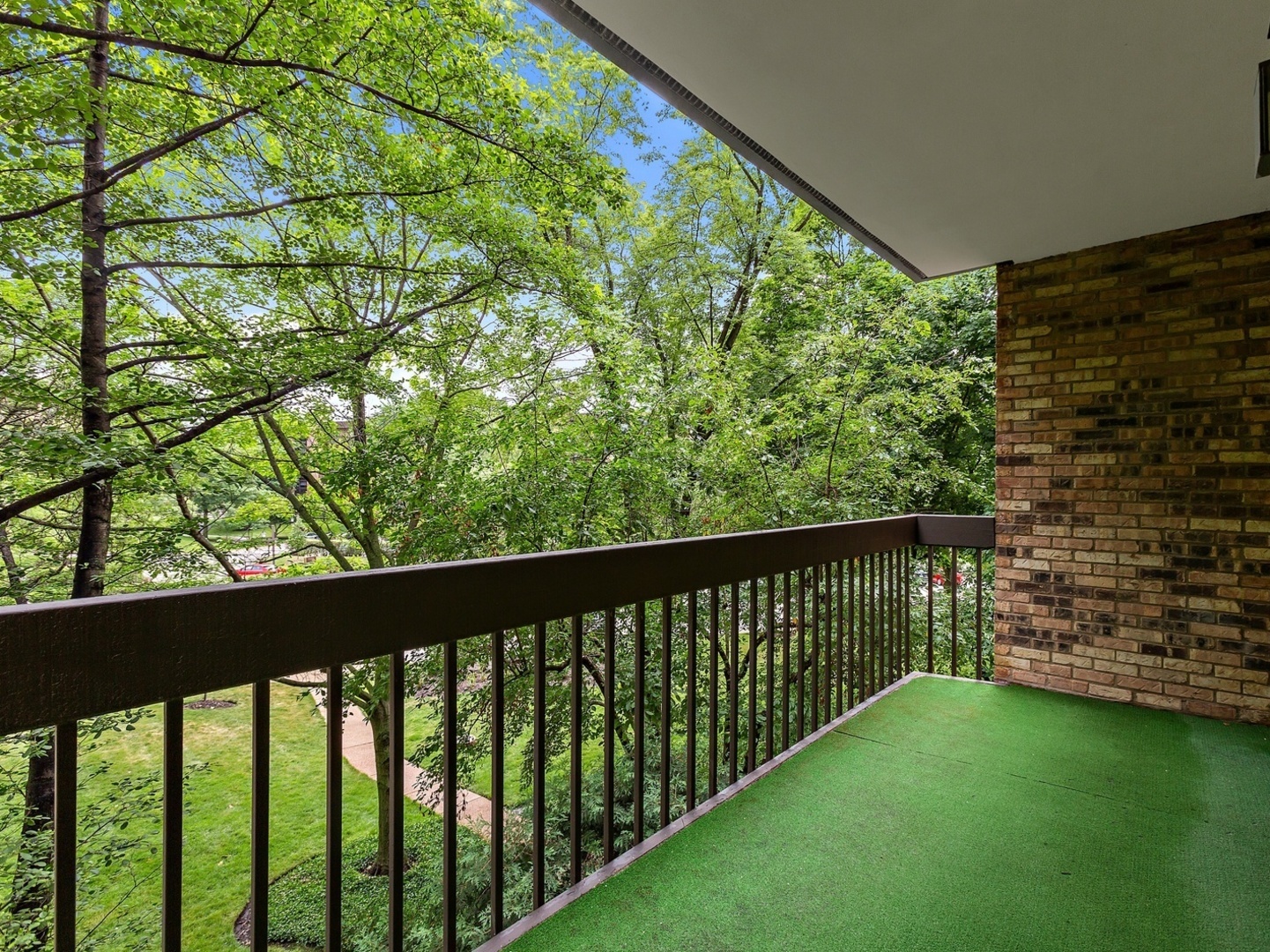1800 Mission Hills Road, Unit 212 Northbrook, IL 60062 - Photo 18 of 19 a view of a balcony with an outdoor space