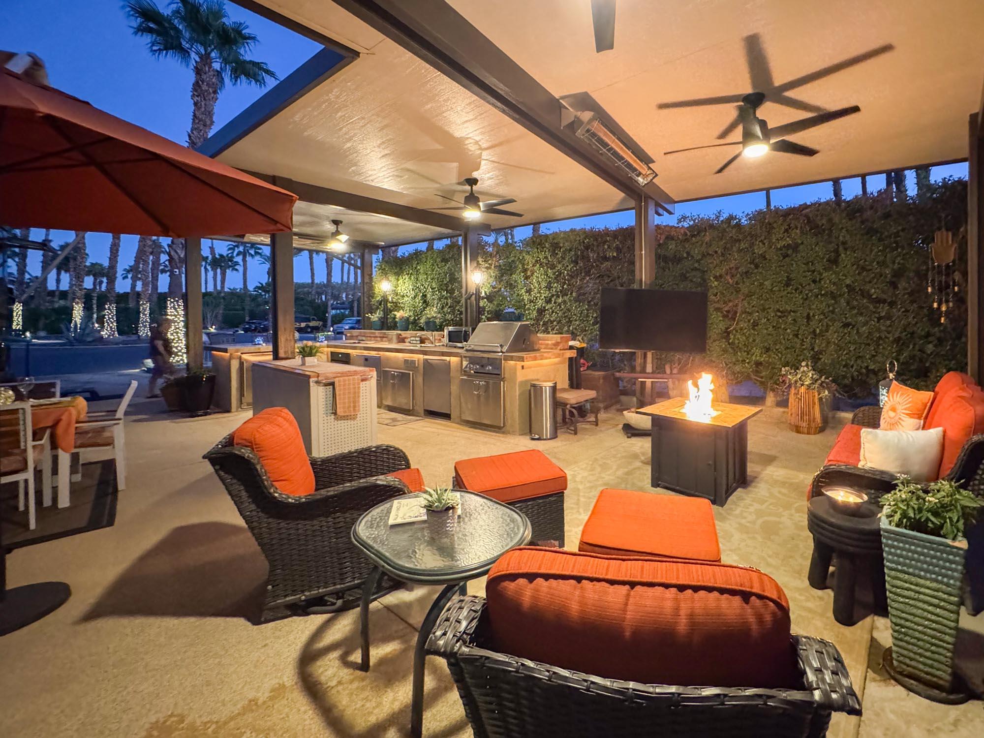 80394 Ave 48, Unit 94 Indio, CA 92201 - Photo 18 of 24 a outdoor space with patio couches and a fireplace