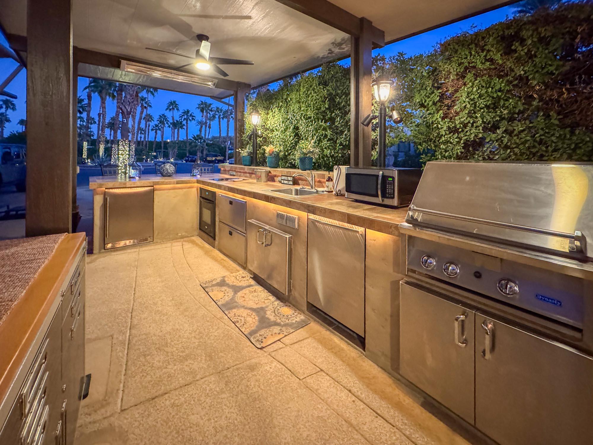 80394 Ave 48, Unit 94 Indio, CA 92201 - Photo 20 of 24 a kitchen with a sink and cabinets