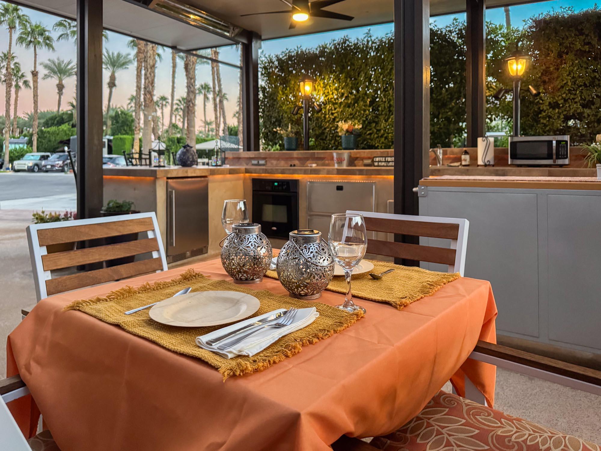 80394 Ave 48, Unit 94 Indio, CA 92201 - Photo 4 of 24 a dining room with furniture a lamp and a large window