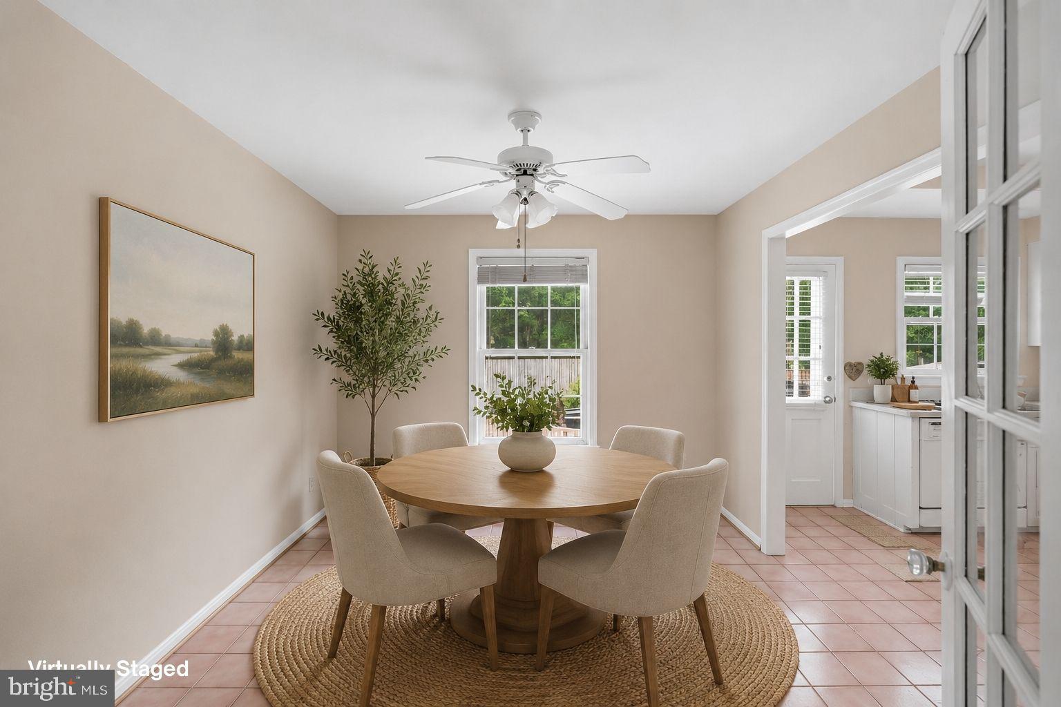 8406 Geneva Mason Road Potomac, MD 20854 - Photo 6 of 20 Breakfast Room w/ Double Doors to Living Room