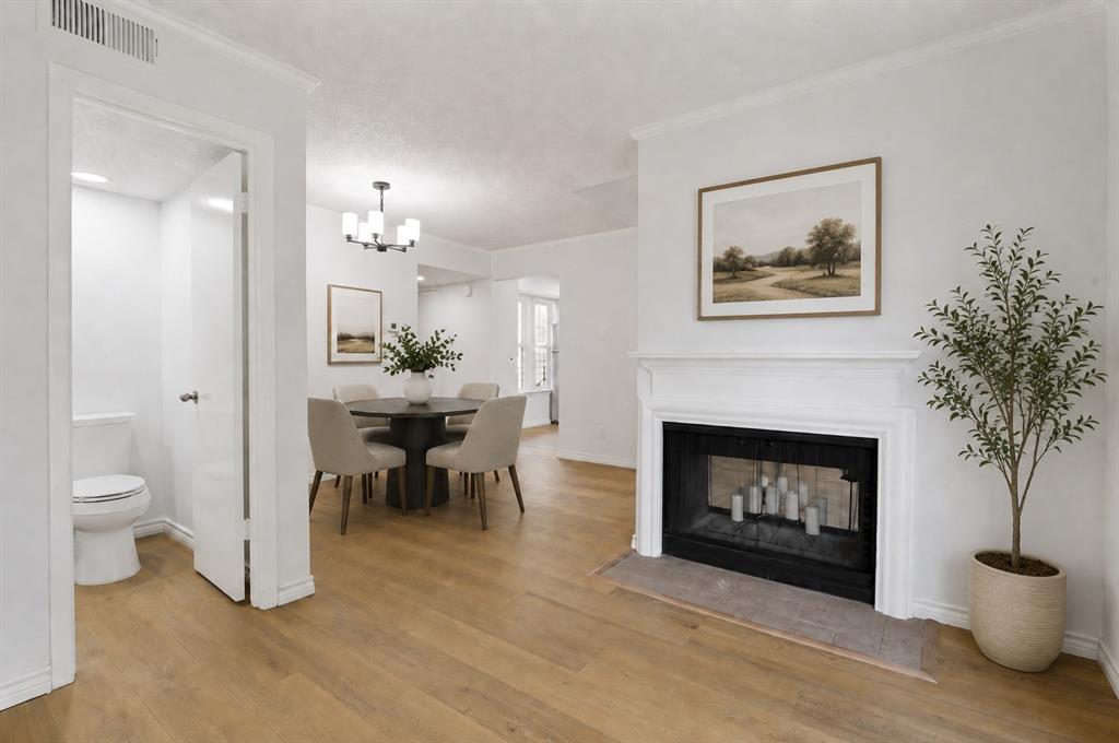 5300 Keller Springs Road, Unit 2042 Dallas, TX 75248 - Photo 11 of 28 AI staged dining room