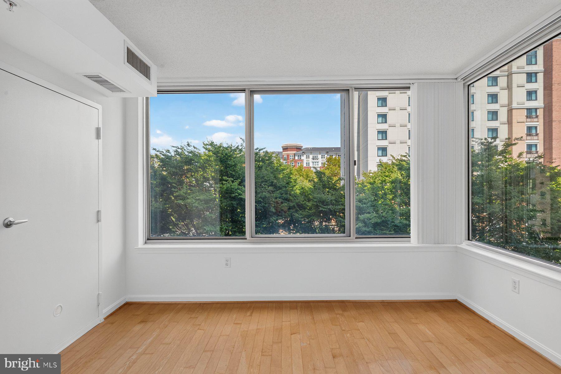 2726 Gallows Road, Unit 101 Vienna, VA 22180 - Photo 7 of 25 Bright, airy space with city views.