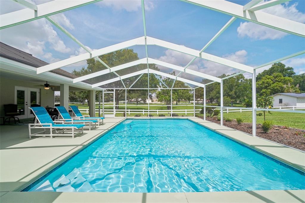 3934 Connersville Road Bartow, FL 33830 - Photo 33 of 81 a view of a house with a swimming pool