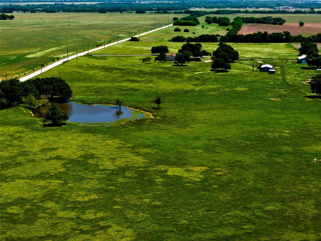 204 Valley View Valley View, TX 76272 - Photo 22 of 23 a view of a golf course with a lake