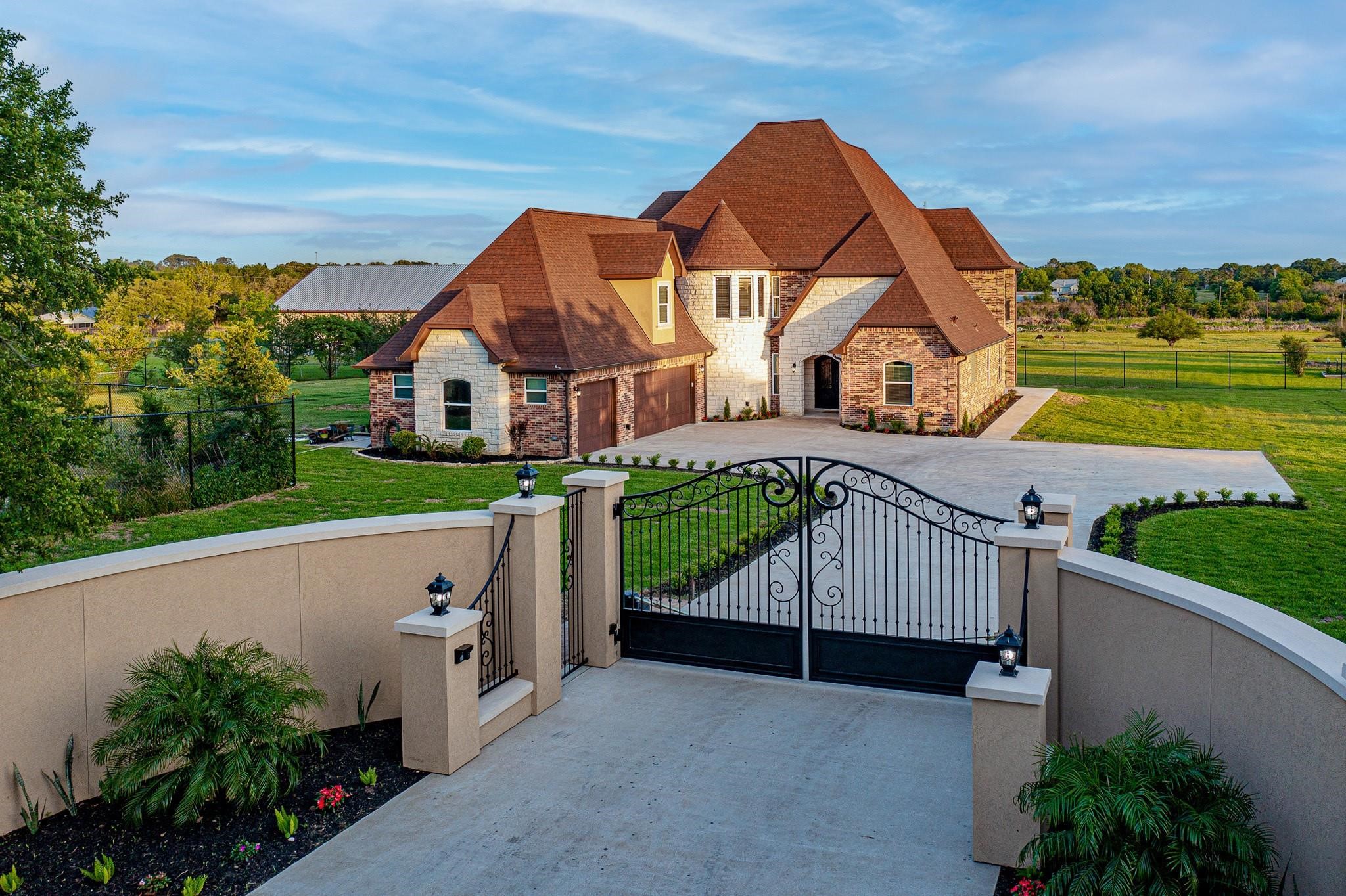 a view of a house with a sink and yard
