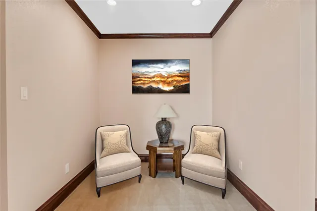 a room with furniture and a flat screen tv