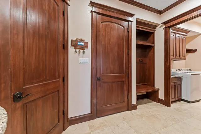 a view of a hallway with closet area