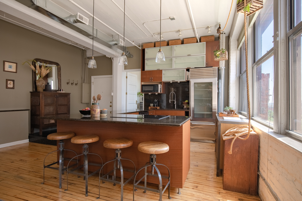 727 South Dearborn Street, Unit 910 Chicago, IL 60605 - Photo 11 of 37 a view of a dining room with furniture window and wooden floor