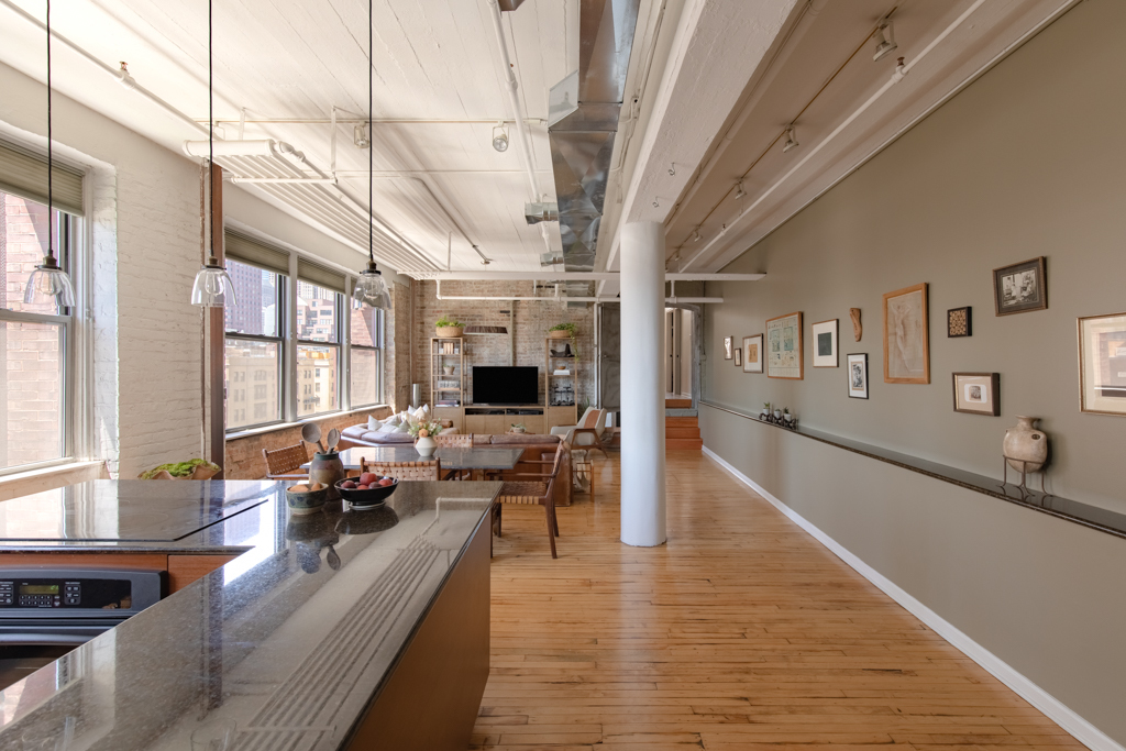 727 South Dearborn Street, Unit 910 Chicago, IL 60605 - Photo 3 of 37 a very nice looking living room with a large window