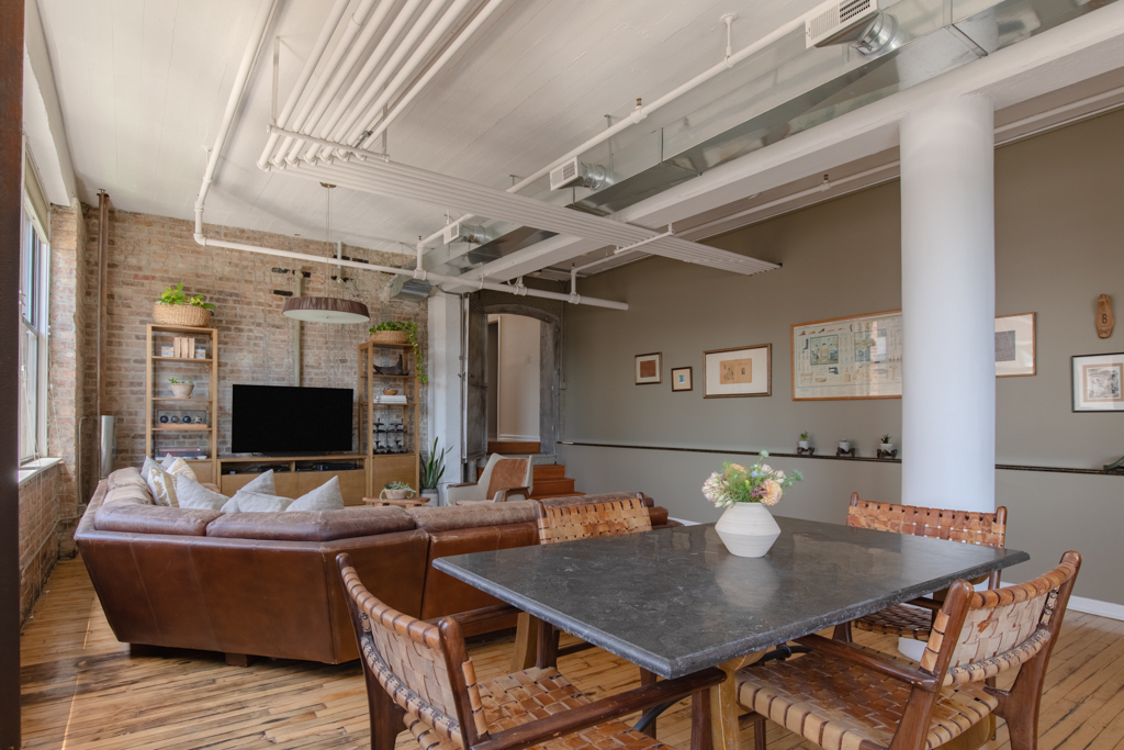 727 South Dearborn Street, Unit 910 Chicago, IL 60605 - Photo 10 of 37 a view of a dining room with furniture