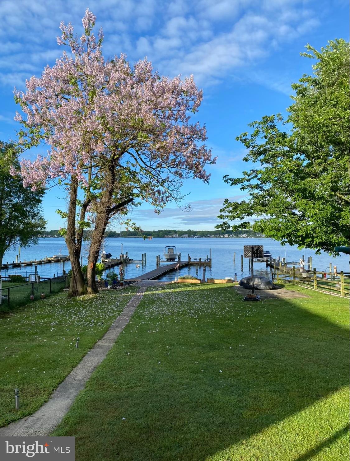 1004 Thompson Boulevard Baltimore, MD 21221 - Photo 1 of 48 a view of a lake with houses
