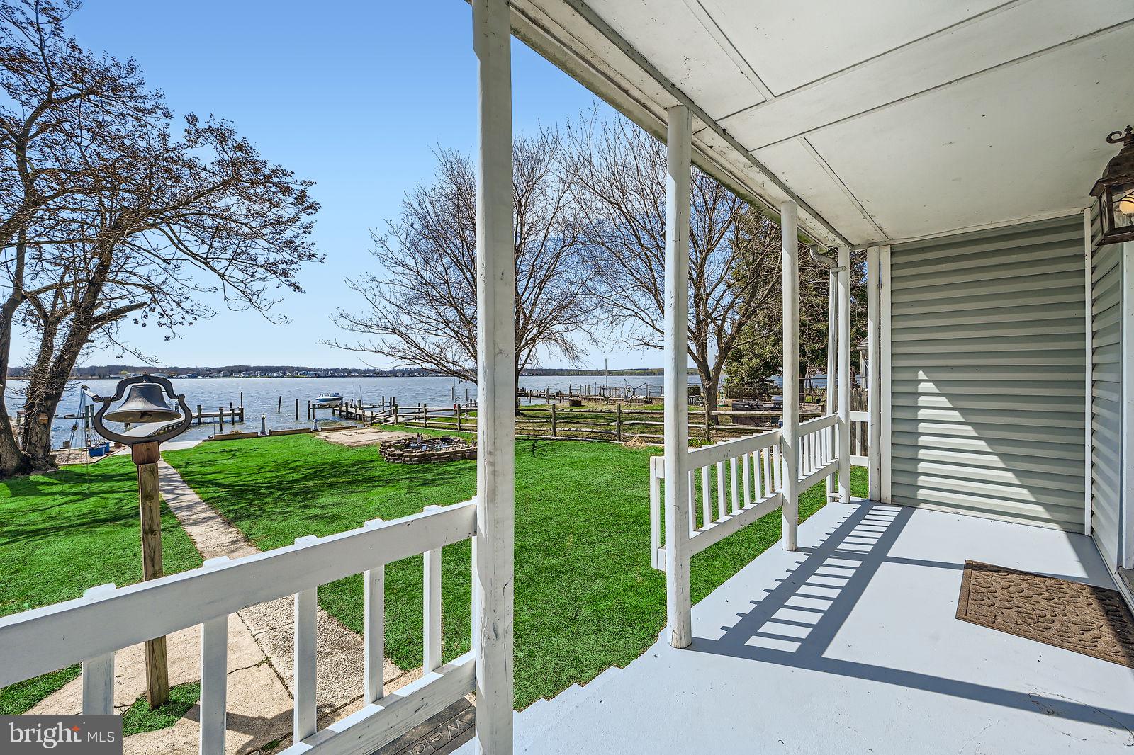 1004 Thompson Boulevard Baltimore, MD 21221 - Photo 2 of 48 a view of a porch with a yard