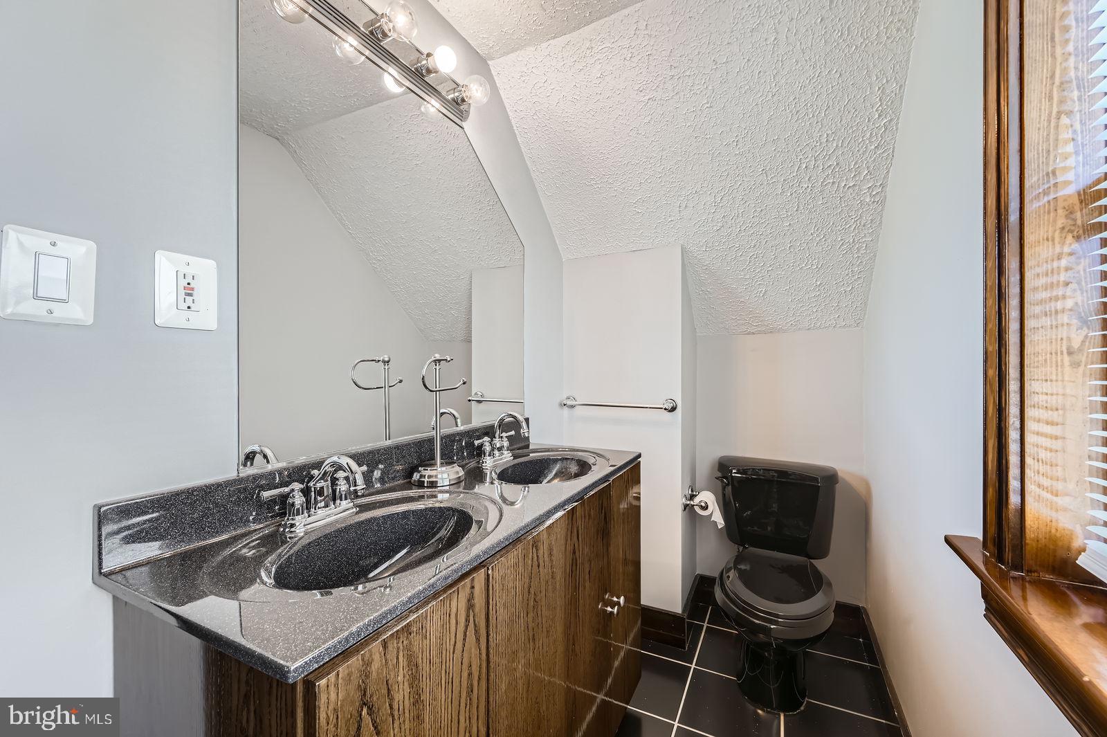 1004 Thompson Boulevard Baltimore, MD 21221 - Photo 36 of 48 Half bath upper level