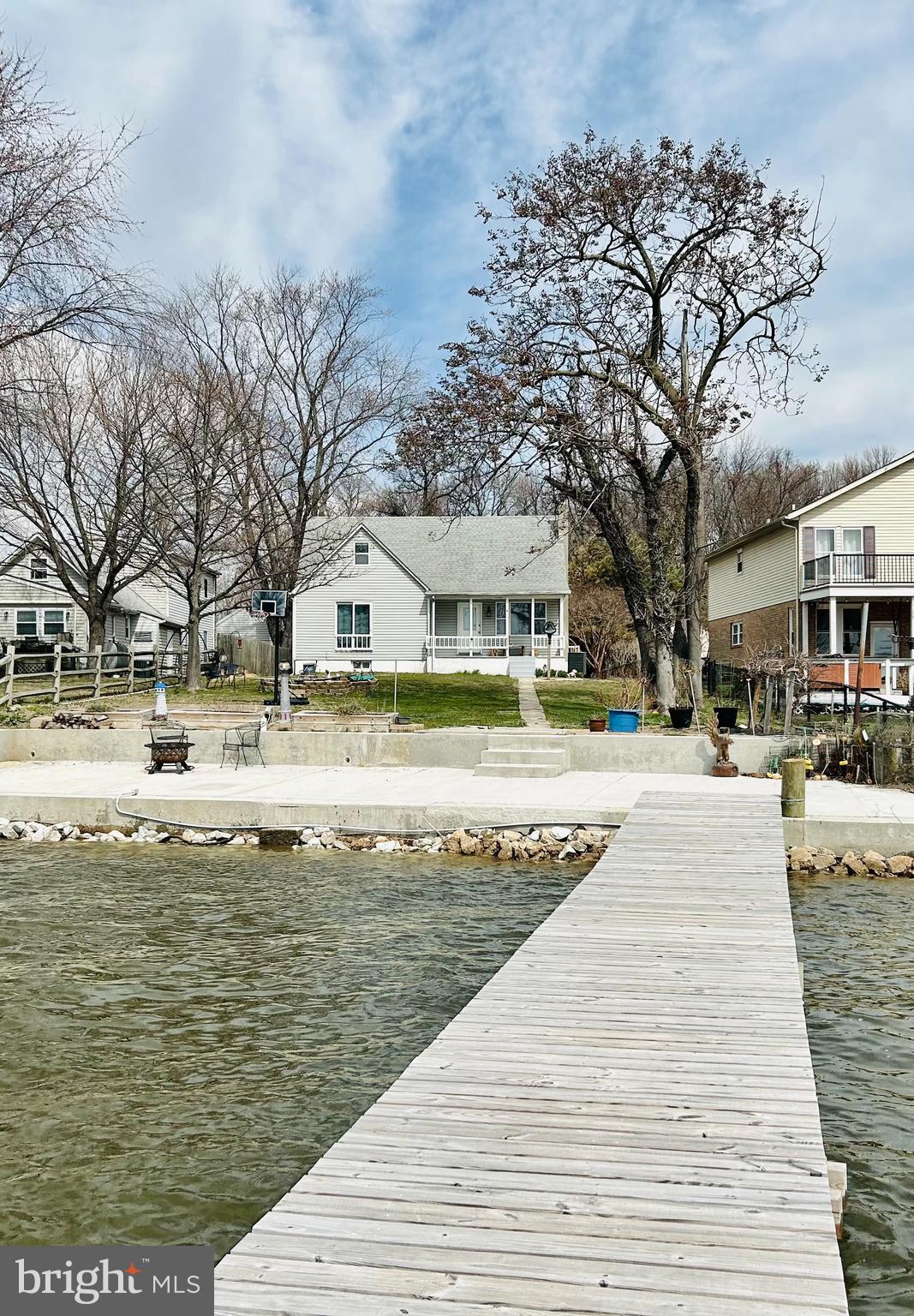 1004 Thompson Boulevard Baltimore, MD 21221 - Photo 37 of 48 level yard with unobstructed water views from home