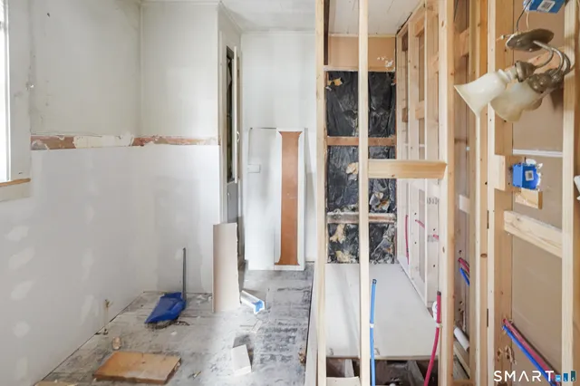 a bathroom with a sink and a window