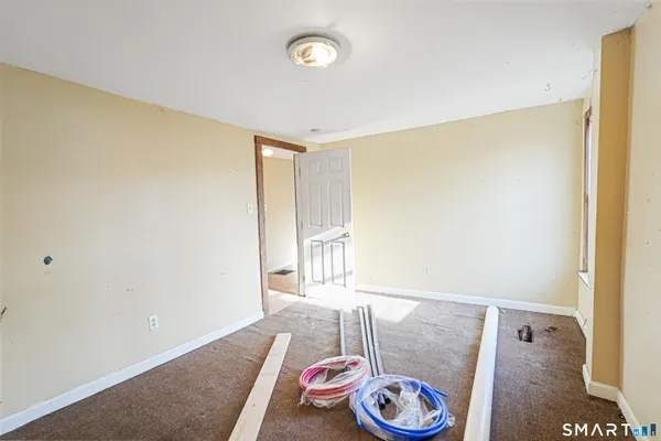 a room with furniture and window