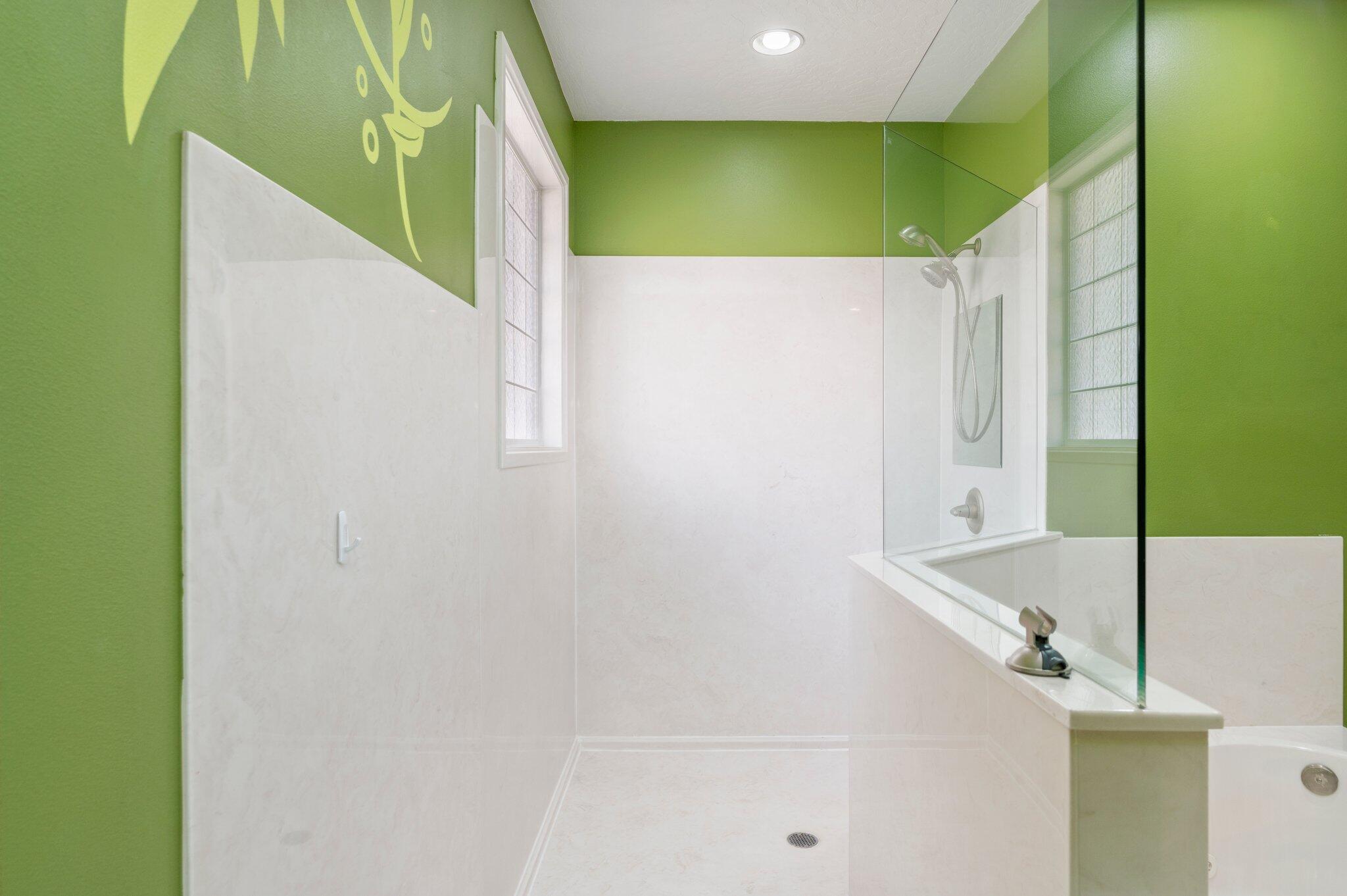 203 Eleases Crossing Crestview, FL 32539 - Photo 20 of 35 a bathroom with a mirror and a shower