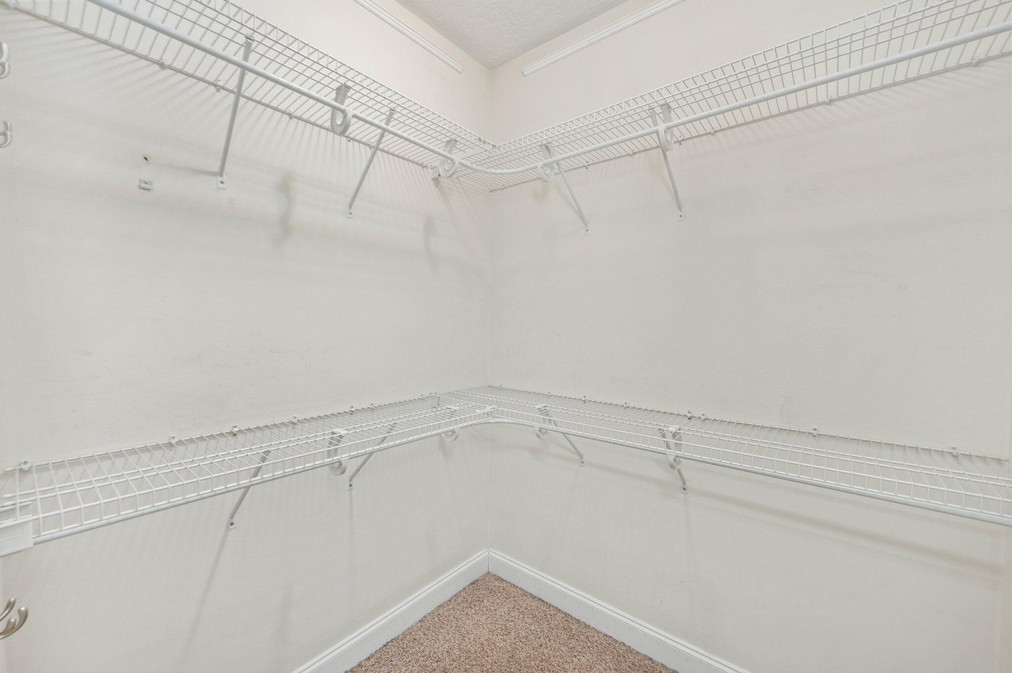 203 Eleases Crossing Crestview, FL 32539 - Photo 21 of 35 a view of a room with racks on the wall