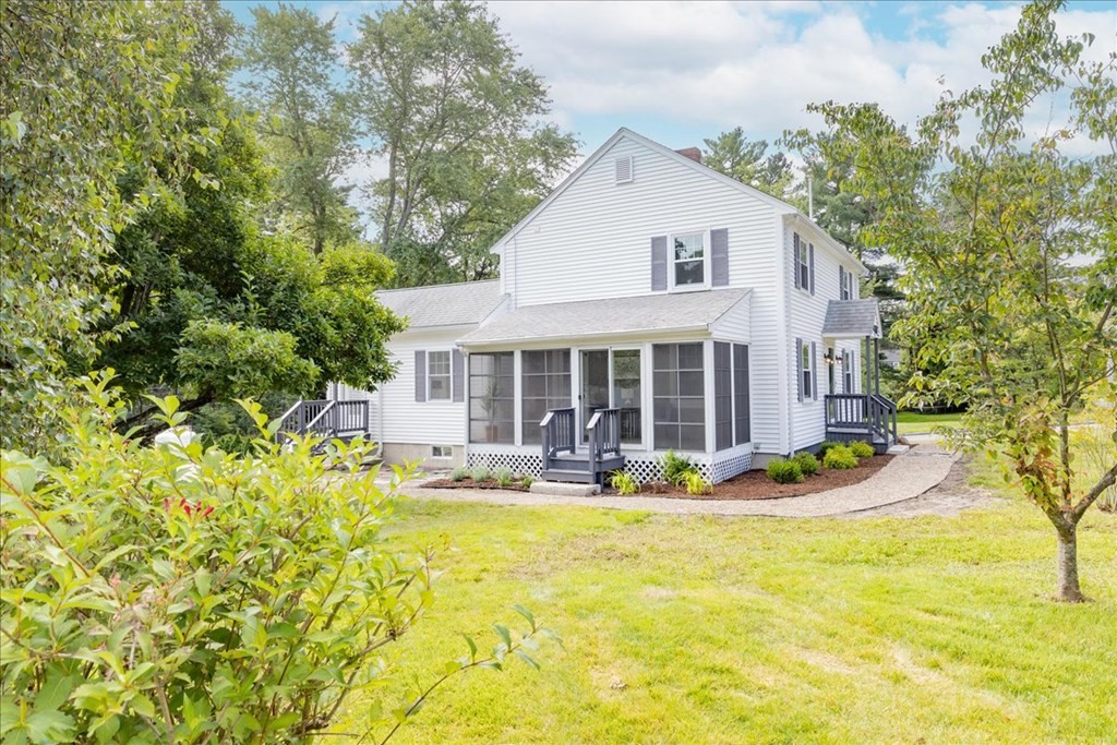 212 Allen Road Billerica, MA 01821 - Photo 34 of 42 a front view of a house with swimming pool and porch with furniture