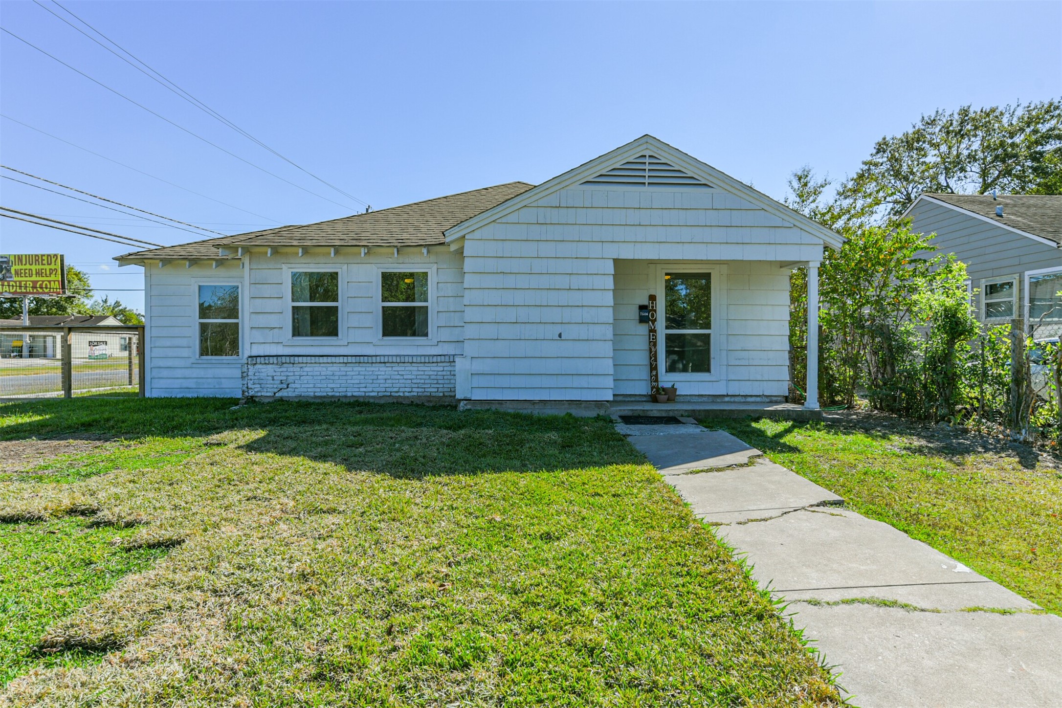 7546 Greendowns Street Houston, TX 77087 - Photo 29 of 33 a front view of a house with garden