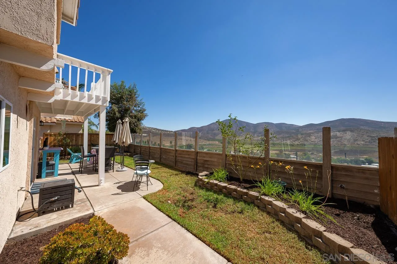 9851 Avenida Ricardo Spring Valley, CA 91977 - Photo 32 of 41 a view of a patio with a table and chairs