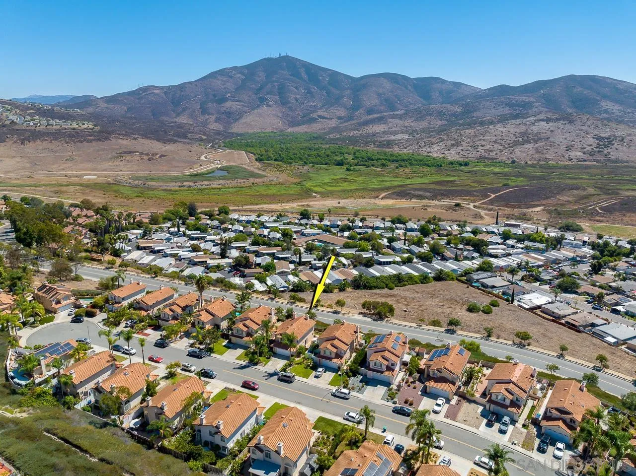 9851 Avenida Ricardo Spring Valley, CA 91977 - Photo 38 of 41 an aerial view of residential house and sandy dunes