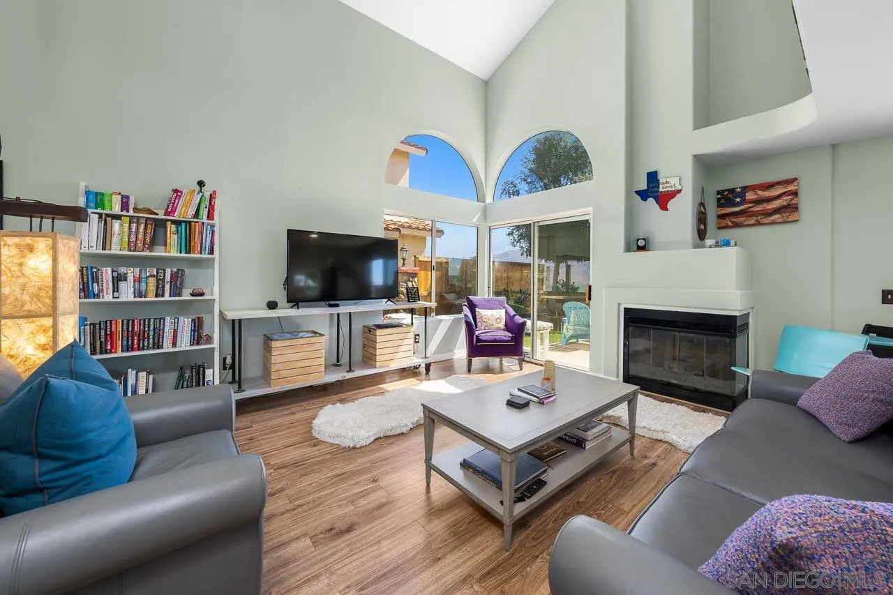 9851 Avenida Ricardo Spring Valley, CA 91977 - Photo 8 of 41 a living room with furniture and a fireplace