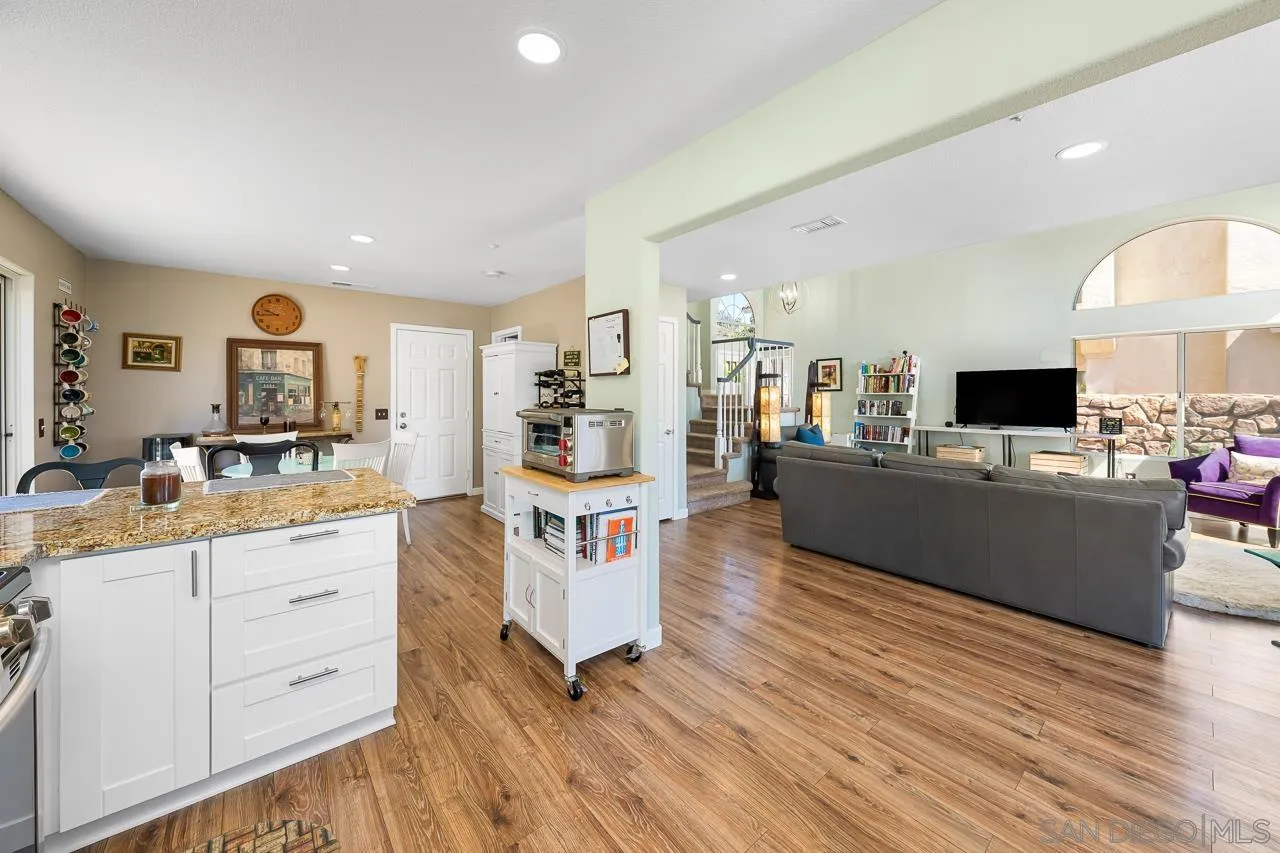 9851 Avenida Ricardo Spring Valley, CA 91977 - Photo 9 of 41 a living room with furniture and kitchen view