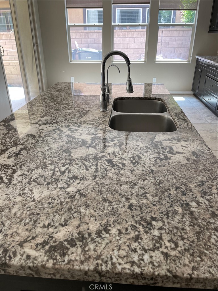 3476 Villa Drive Brea, CA 92823 - Photo 5 of 16 a bathroom with a sink and a mirror