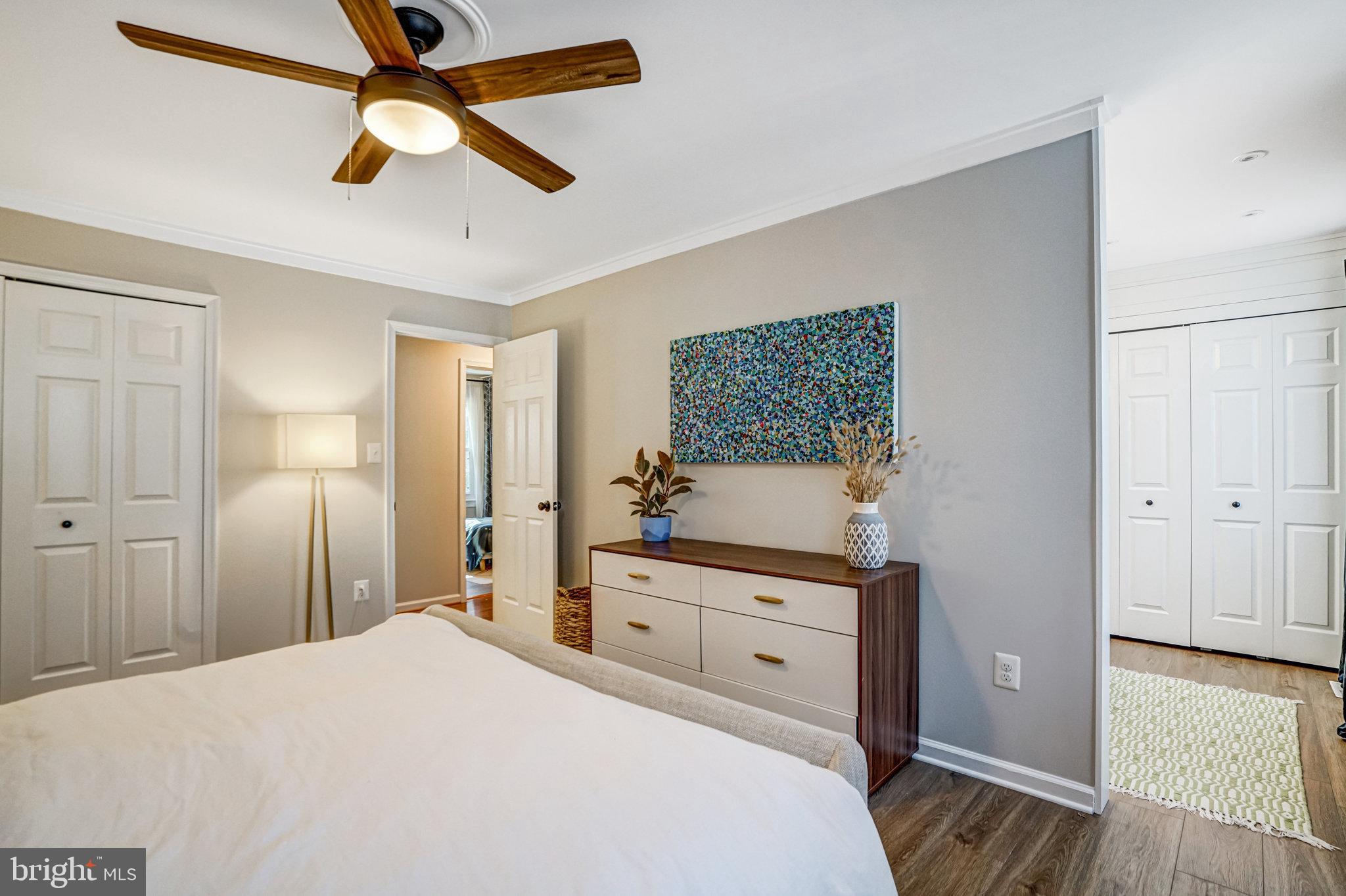 7923 Forest Path Way Springfield, VA 22153 - Photo 17 of 39 a bedroom with a bed and a dresser