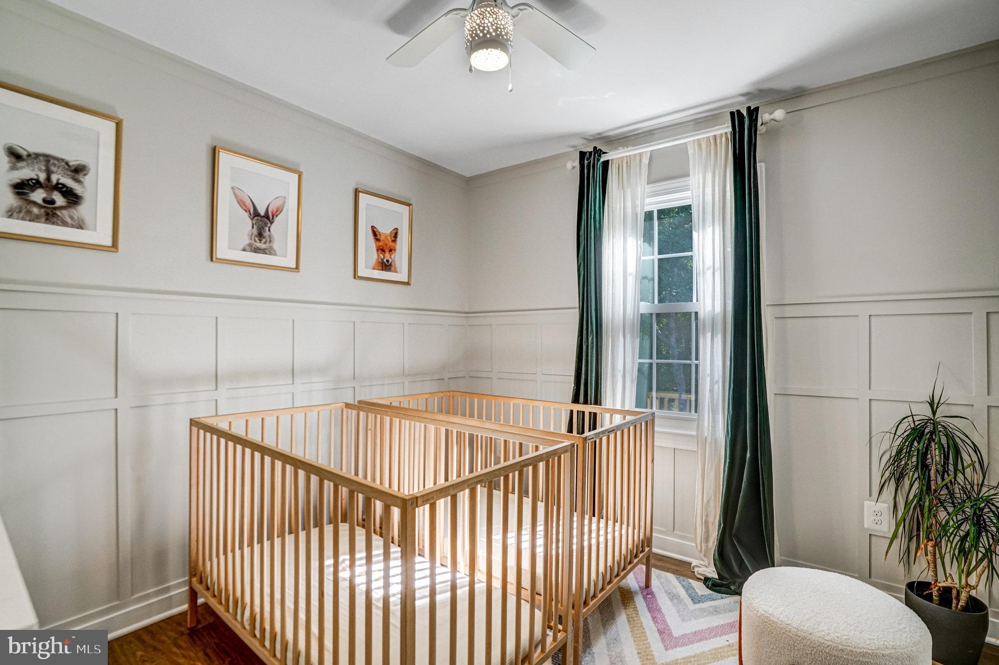 7923 Forest Path Way Springfield, VA 22153 - Photo 24 of 39 a bedroom with a bed and a window