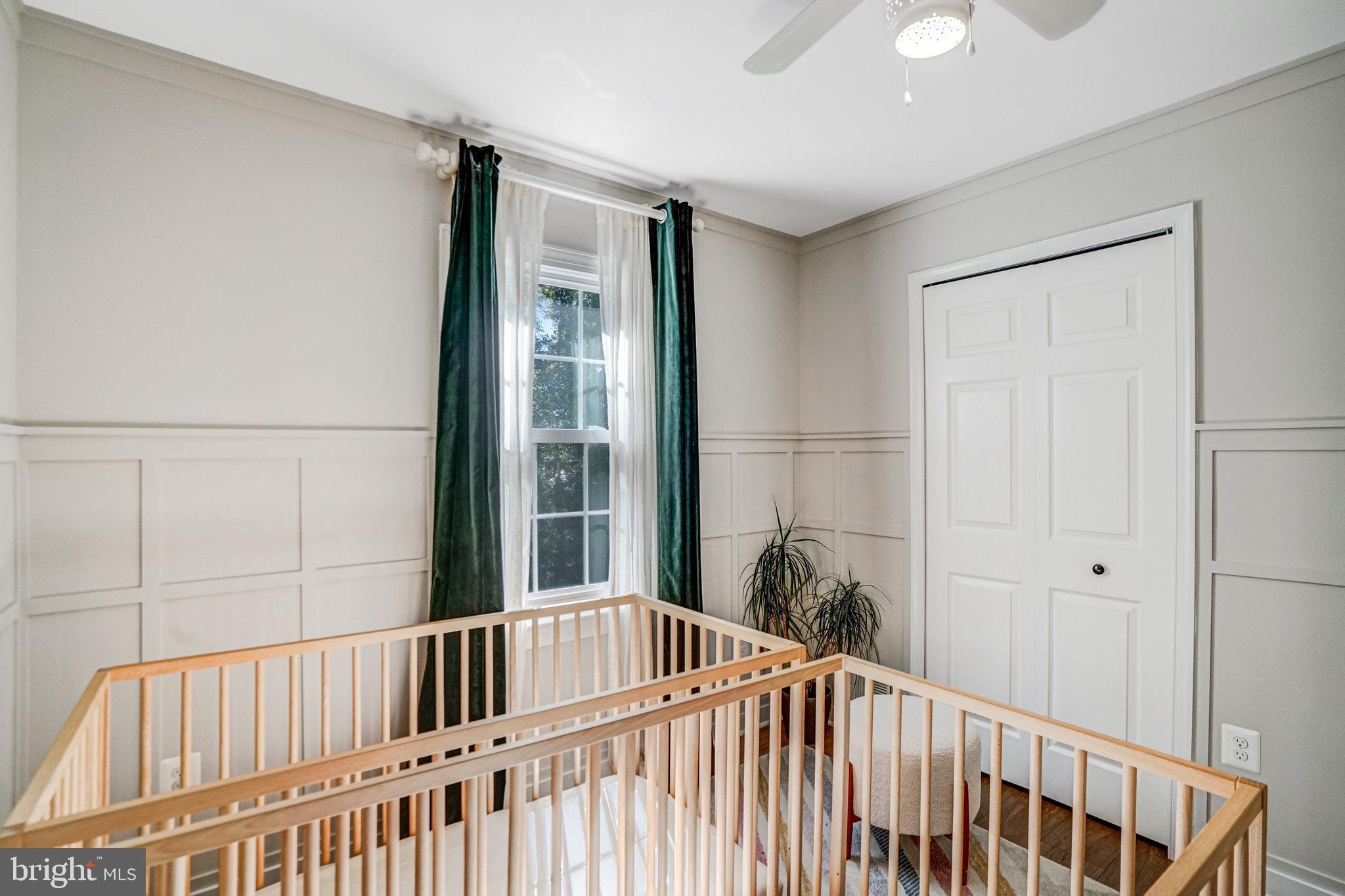 7923 Forest Path Way Springfield, VA 22153 - Photo 25 of 39 a bedroom with a bed and a window