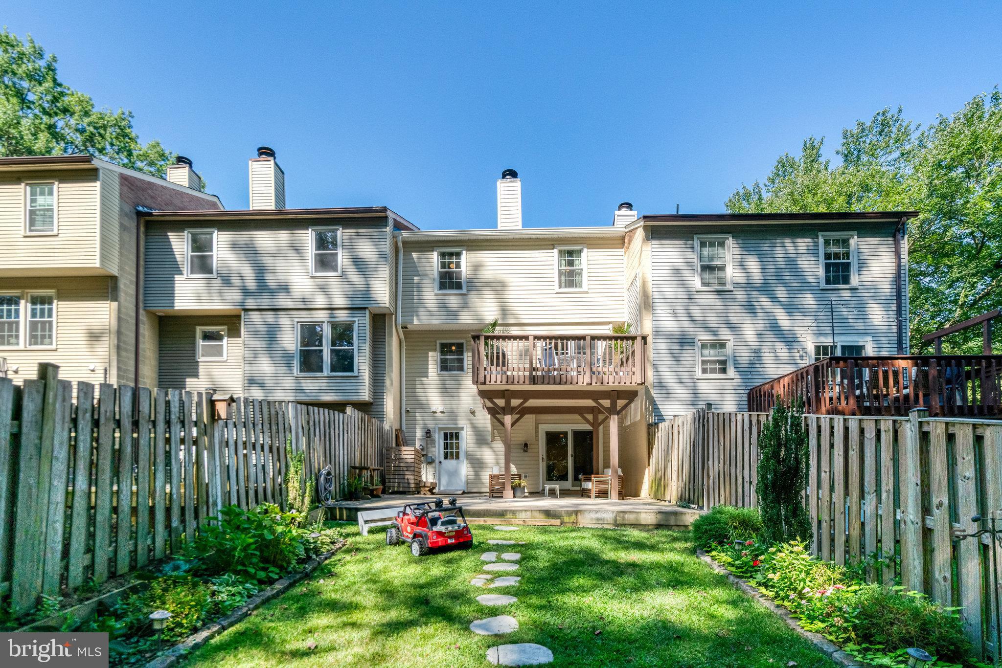 7923 Forest Path Way Springfield, VA 22153 - Photo 34 of 39 a front view of a house with garden