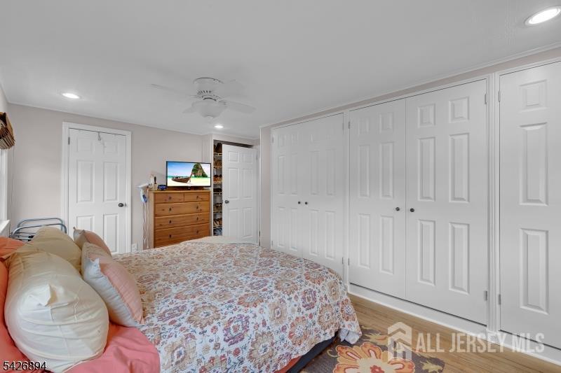 233 Maple Avenue Dunellen, NJ 08812 - Photo 21 of 39 a bedroom with a bed and a cabinet