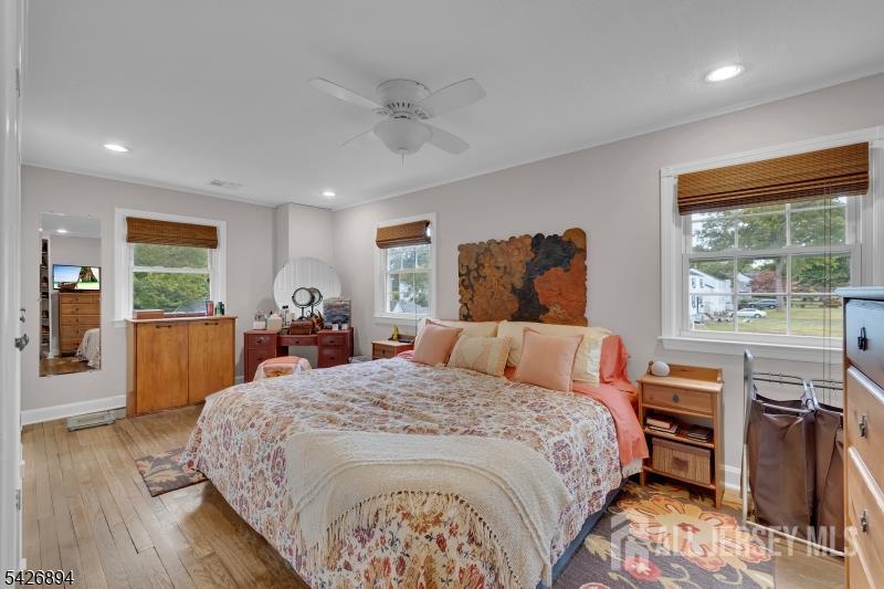 233 Maple Avenue Dunellen, NJ 08812 - Photo 22 of 39 a bed room with a bed and a dresser