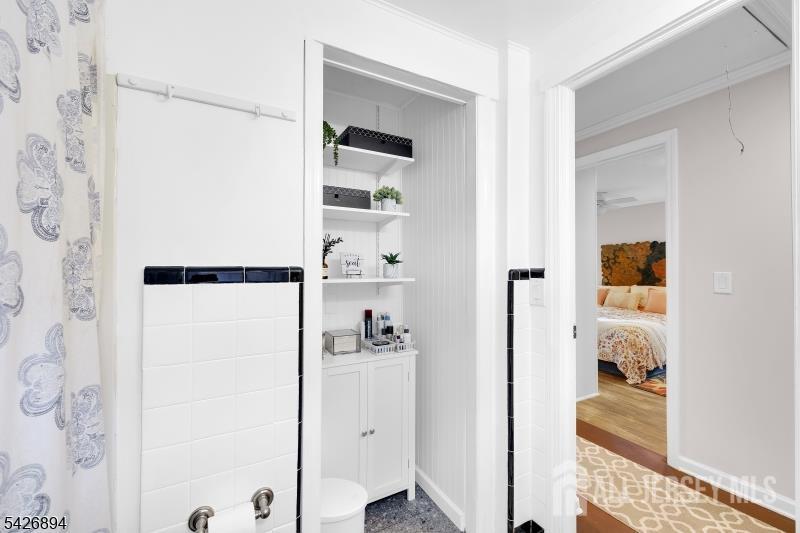 233 Maple Avenue Dunellen, NJ 08812 - Photo 25 of 39 a bathroom with a shower and a sink