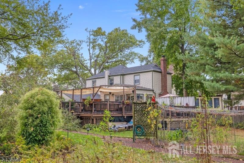 233 Maple Avenue Dunellen, NJ 08812 - Photo 27 of 39 front view of a house with a garden