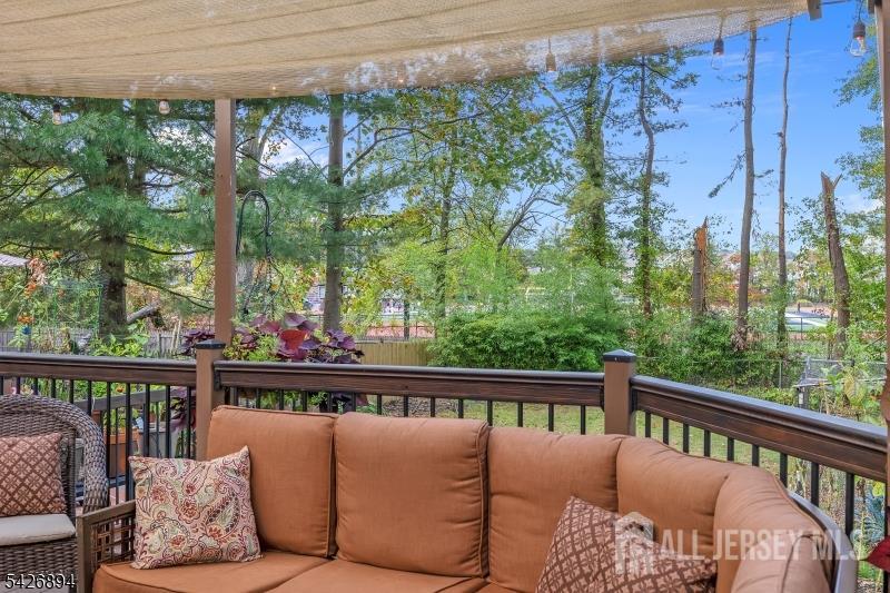 233 Maple Avenue Dunellen, NJ 08812 - Photo 30 of 39 a view of a two chairs in the balcony